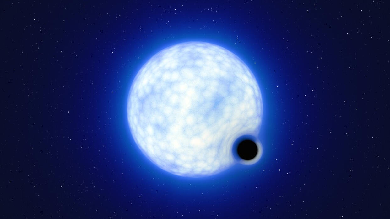  A spotted blue star shines bright, emanating its light across space as a small black sphere in its lower right corner intrudes on its reality. 