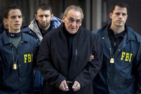 Alleged Bonanno crime family leader Vincent Asaro is escorted by FBI agents from their Manhattan offices in New York January 23, 2014. REUTERS/Brendan McDermid