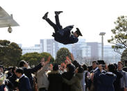 <p>A South Korean graduate is thrown into the air during a graduation ceremony at Sungkyunkwan University in Seoul, South Korea, Friday, Feb. 24, 2017. (Photo: Ahn Young-joon/AP) </p>