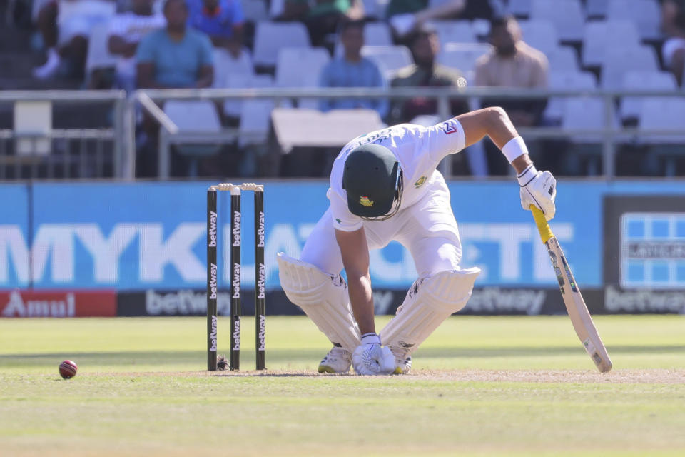 South African batsman Aiden Markram almost collapses after been struck by the ball during the second test match between South Africa and India in Cape Town, South Africa, Wednesday, Jan. 3, 2024. (AP Photo/Halden Krog)