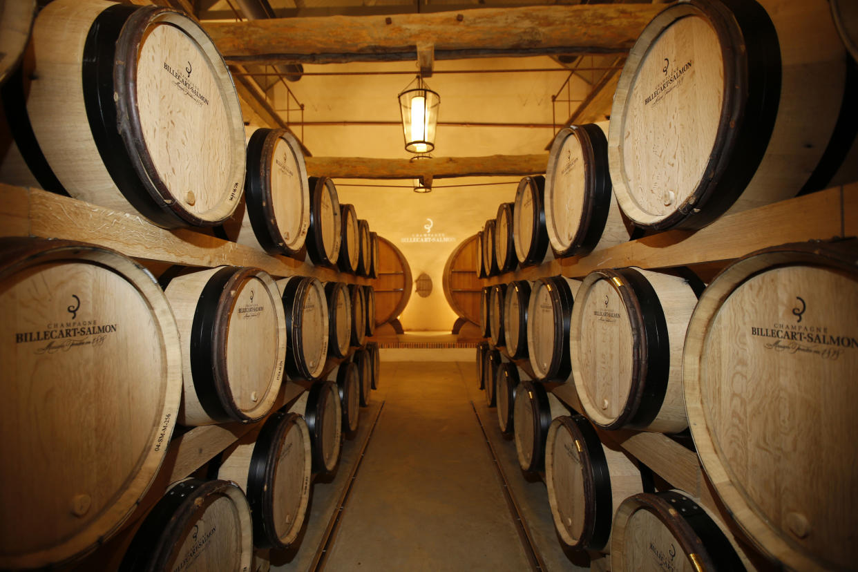 Rows of barrels are seen in the Billecart-Salmon winery in Mareuil-sur-Ay, eastern France during the traditional Champagne wine harvest October 7, 2013. The end of September start of the 2013 grape harvest was the latest in the last 30 years. Weather conditions permitted grapes in the vineyards to reach maturity and cool temperatures enabled an even quality of the fruit throughout the harvest. Picture taken October 7, 2013.   REUTERS/Benoit Tessier (FRANCE - Tags: AGRICULTURE FOOD BUSINESS)