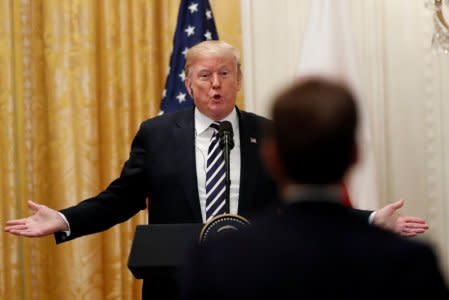 U.S. President Donald Trump answers a question about the nomination of Judge Brett Kavanaugh to the U.S. Supreme Court and allegations of sexual assault against Kavanaugh during a joint news conference with Poland's President Andrzej Duda in the East Room of the White House in Washington, U.S., September 18, 2018. REUTERS/Kevin Lamarque