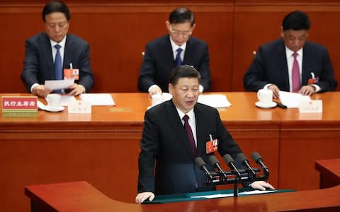 Chinese President Xi Jinping delivers a speech during the closing session of the National People's Congress (NPC) at the Great Hall of the People on March 20 - Credit: Lintao Zhang/Getty Images