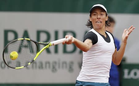 Tennis - French Open - Roland Garros - Francesca Schiavone of Italy vs France's Kristina Mladenov - Paris, France - 24/05/16. Francesca Schiavone returns the ball. REUTERS/Gonzalo Fuentes