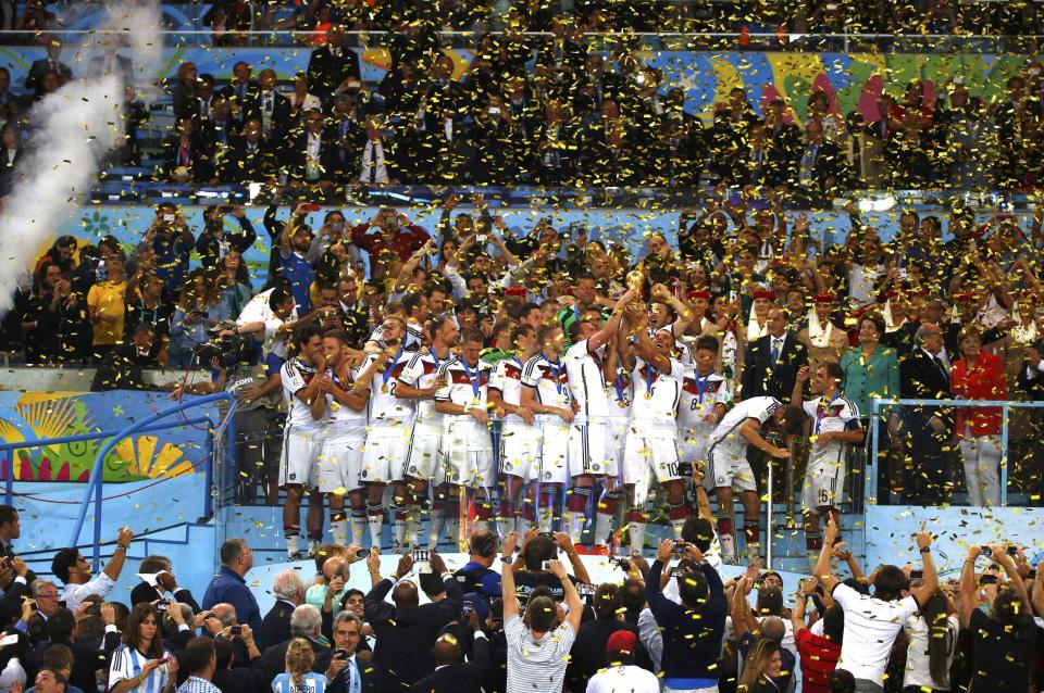 Germany players celebrate after winning the 2014 World Cup final between Germany and Argentina at the Maracana stadium