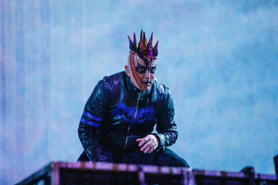 Maynard James Keenan, frontman of the metal band, Tool, stays toward the back of the stage, on a platform, as he performs at the Footprint Center in Phoenix, Arizona on Jan. 21, 2022.