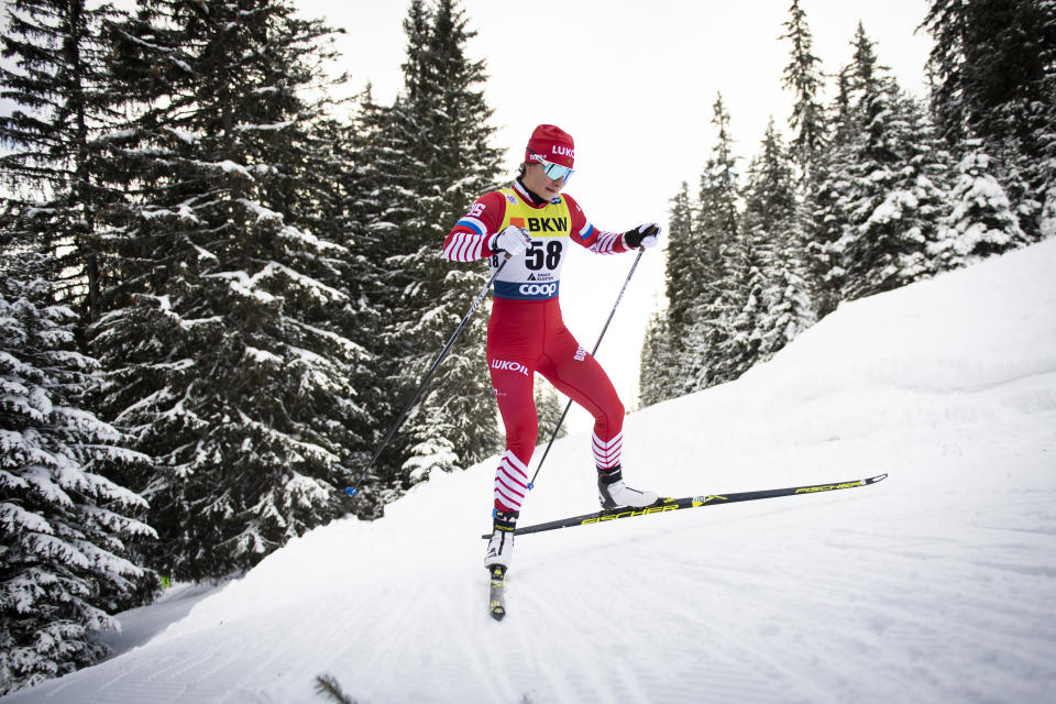 FILE - Natalia Nepryaeva of Russia competes during the women's 10 km free style race at the Davos Nordic FIS Cross Country World Cup in Davos, Switzerland, on Dec. 16, 2018. The 2022 Olympics is just weeks away with China a more problematic host than expected for a Winter Games that had once seemed destined for Europe. The past weekend of World Cup ski events in two upscale Swiss towns that wanted to stage these Olympics showed what might have been. Games in snow-covered resorts with decades of winter sports tradition and without diplomatic boycotts or talk of human rights records. (Gian Ehrenzeller/Keystone via AP, File)