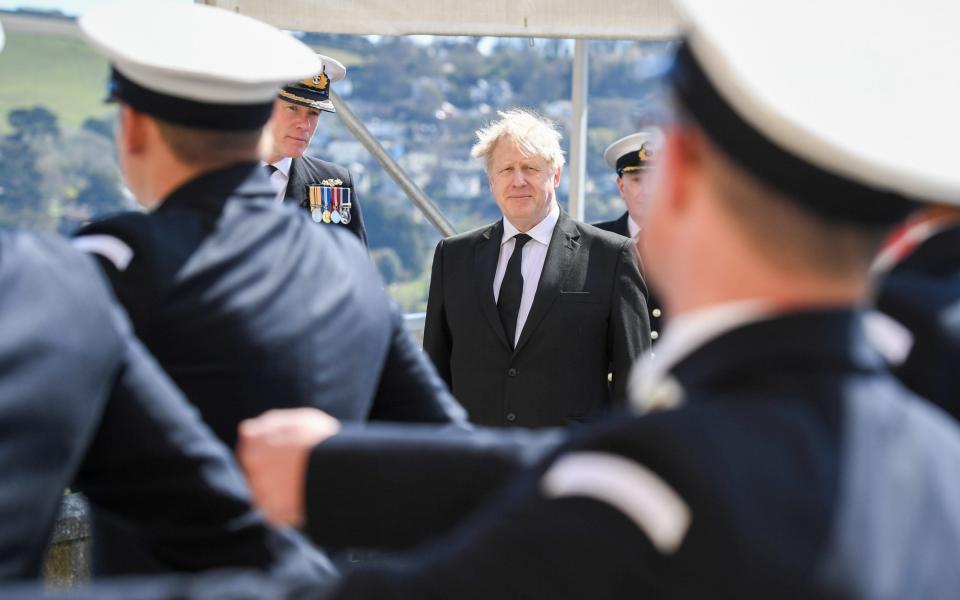 Boris Johnson attends a passing-out parade - Getty