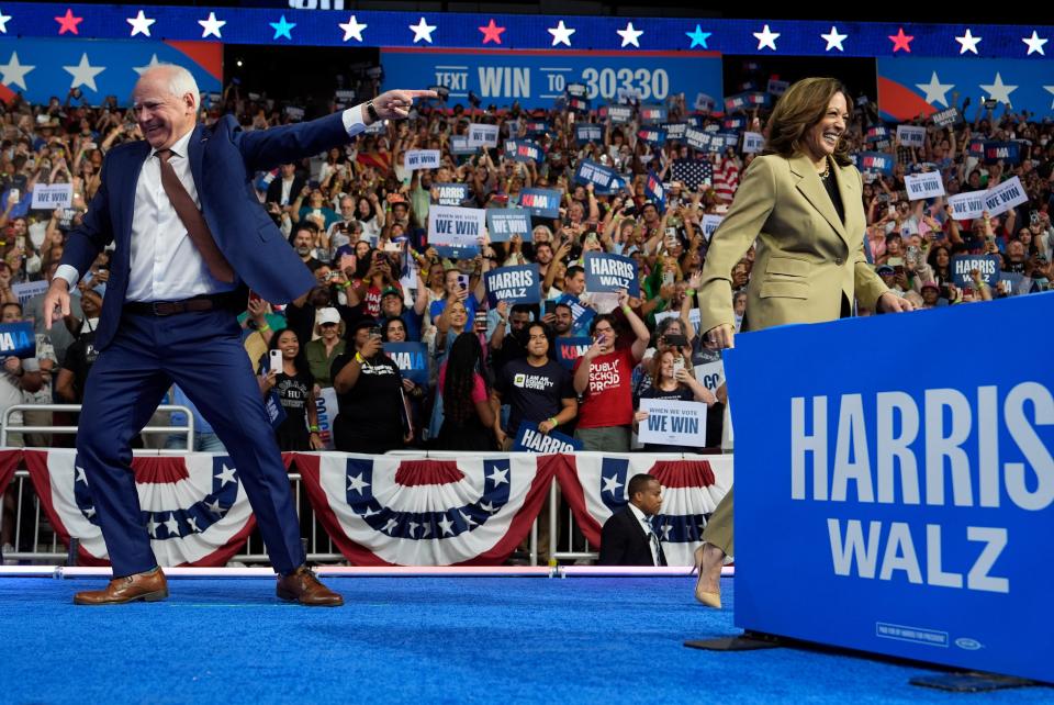 Democratic presidential nominee Vice President Kamala Harris and her enthusiastic running mate Minnesota Gov Tim Walz at a campaign rally at Desert Diamond Arena in Glendale, Arizona (AP)