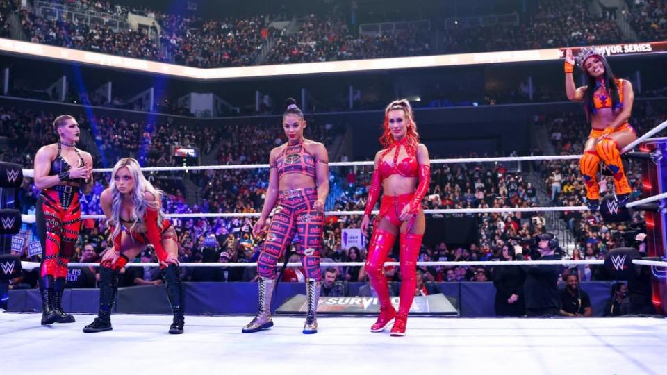 Bianca Belair (centre) won the elimination tag match for her team.jpg (WWE)