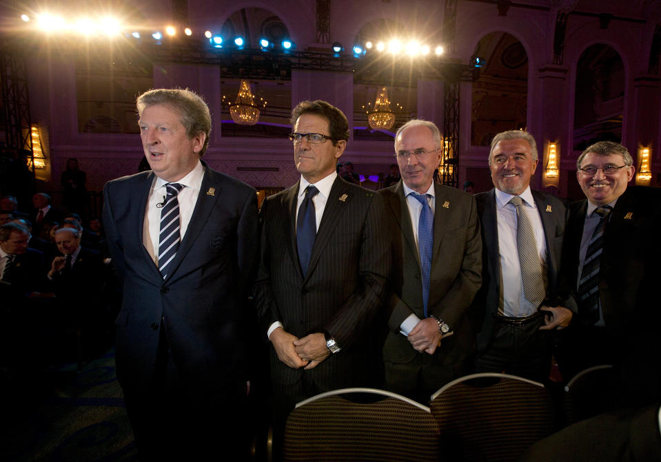 FILE - From left, former England managers Roy Hodgson, Fabio Capello, Sven-Goran Eriksson, Terry Venables, and Graham Taylor pose for photographs at the launch of the English Football Association's150th anniversary year in central London, Wednesday, Jan. 16, 2013. Former England, Tottenham and Barcelona manager Terry Venables has died, it was announced Sunday, Nov. 26, 2023. He was 80. (AP Photo/Alastair Grant, file)