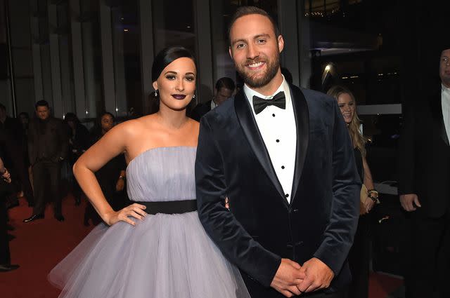 <p>Rick Diamond/Getty</p> Kacey Musgraves and Ruston Kelly at the CMA Awards in 2016