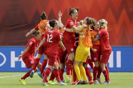 Jul 4, 2015; Edmonton, Alberta, CAN; England reacts after scoring a goal against Germany in extra time during the third place match of the FIFA 2015 Women's World Cup at Commonwealth Stadium. Erich Schlegel-USA TODAY Sports -