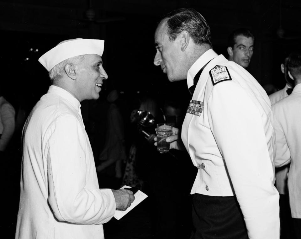 INDIA NEHRU MOUNTBATTEN: Jawaharlal Nehru, left, and British Viceroy, Lord Louis Mountbatten, are shown at the Viceroy’s independence day party for Americans in New Delhi, India, July 4, 1947. (AP Photo)