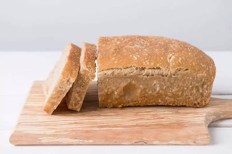 Loaf of white bread sliced