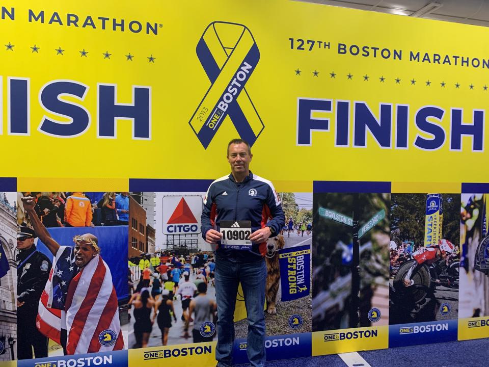 Kentucky native Jason Booher at the finish of the Boston Marathon. Booher is a survivor of the 1988 Carrollton bus crash, the nations deadliest drinking and driving crash.