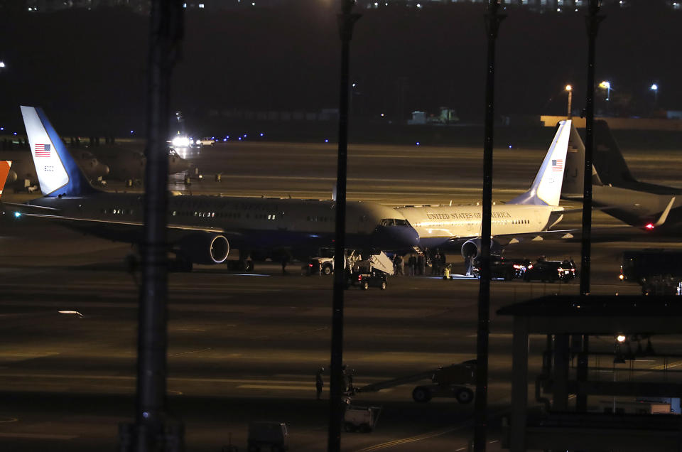 <p>A U.S. government plane, left, lands at Yokota U.S. Airbase on the outskirts of Tokyo, Wednesday, May 9, 2018. Three Americans detained in North Korea for more than a year are on their way back to the U.S. with Secretary of State Mike Pompeo, President Donald Trump announced Wednesday in the latest sign of improving relations between the two longtime adversary nations. (Photo: Eugene Hoshiko/AP) </p>