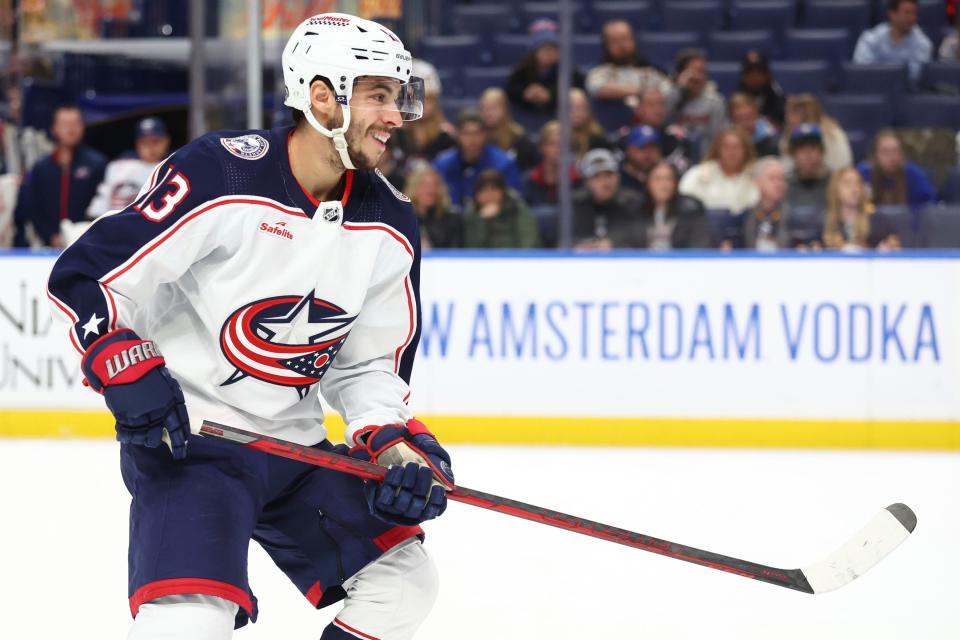 Columbus Blue Jackets left wing Johnny Gaudreau smiles after scoring a goal against the Buffalo Sabres during the first period of an NHL hockey game Tuesday, Dec. 19, 2023, in Buffalo, N.Y. (AP Photo/Jeffrey T. Barnes)