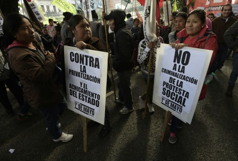 Workers demonstrate in Buenos Aires on April 29, 2016 against the government's cuts in public expenditure and jobs