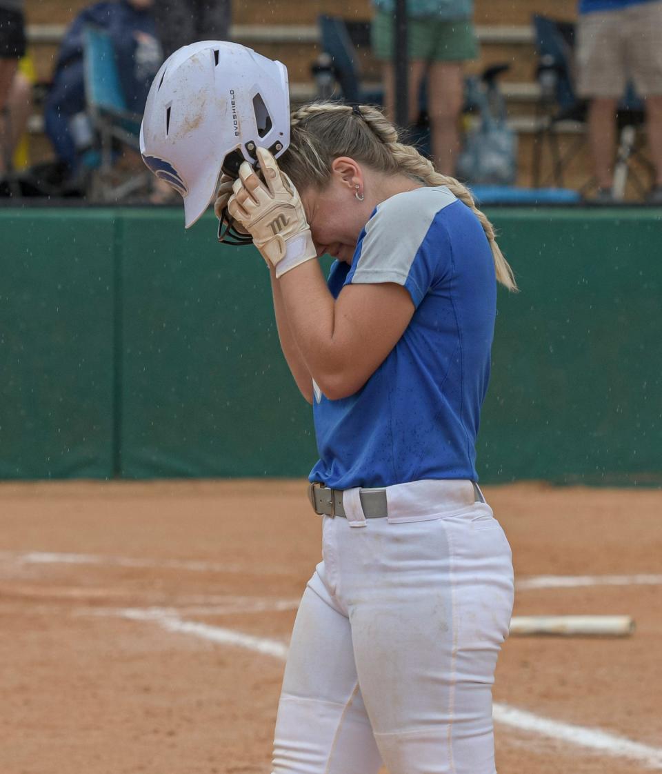 Deltona's Morgan Davis (9) reacts after the Wolves fell to  Parrish Community High School at the Class 5A state championship game at Legends Way Ball Fields in Clermont on Thursday.