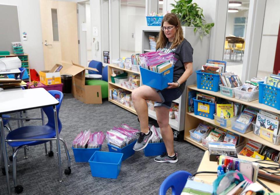 Fourth grade teacher Joanne Londe finishes unpacking while getting her classroom ready at North Ridge Elementary School in this 2019 file photo. Londe is among the nationally board certified teachers in the Wake County school system.