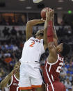 Virginia's Braxton Key (2) attempts to shoot over Oklahoma's Kristian Doolittle (21) during the second half of a second-round men's college basketball game in the NCAA Tournament in Columbia, S.C., Sunday, March 24, 2019. (AP Photo/Richard Shiro)