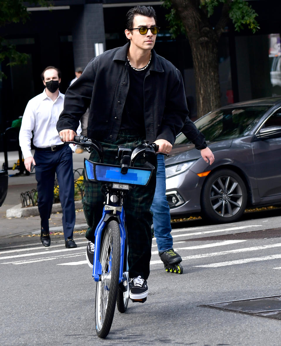 <p>Joe Jonas hops on a Citi Bike to ride around N.Y.C. on Oct. 12.</p>