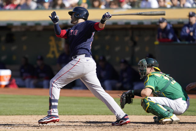 Kemp's sacrifice fly lifts A's over Red Sox 7-6 in 12