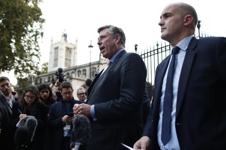 Graham Brady, left, Chairman of the 1922 Committee, and Jake Berry, right, Chairman of the Conservative Party, speak to media outside Parliament in London, Thursday, Oct. 20, 2022. Britain's Prime Minister liz Truss resigned Thursday, bowing to the inevitable after a tumultuous, short-lived term in which her policies triggered turmoil in financial markets and a rebellion in her party that obliterated her authority. (AP Photo/David Cliff)