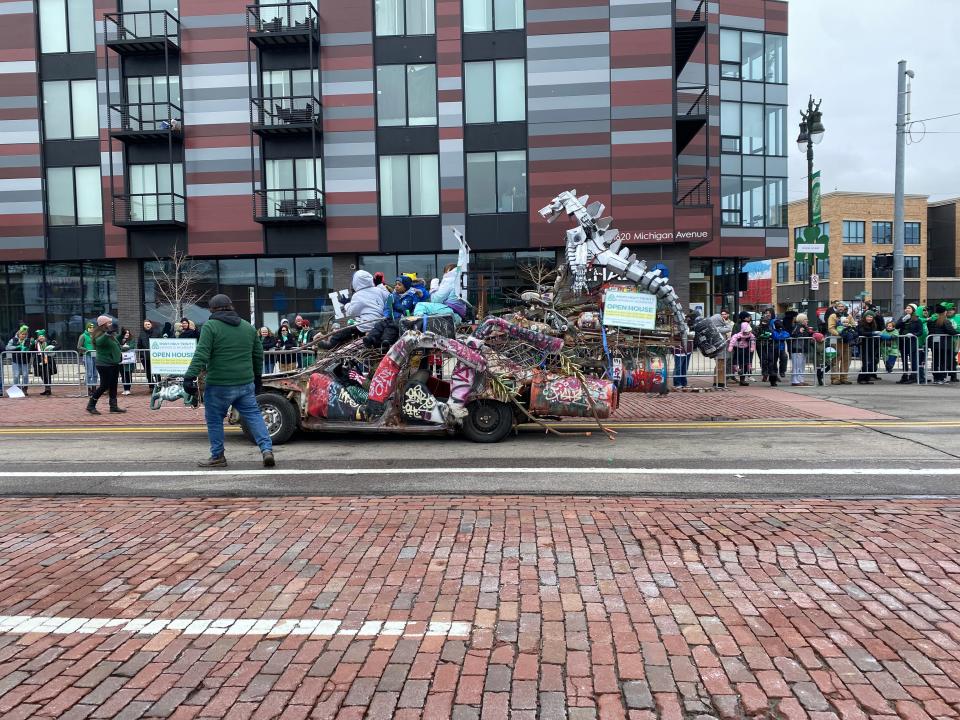 A float travels along Michigan Avenue in Corktown Sunday during the annual St. Patrick's Day Parade.