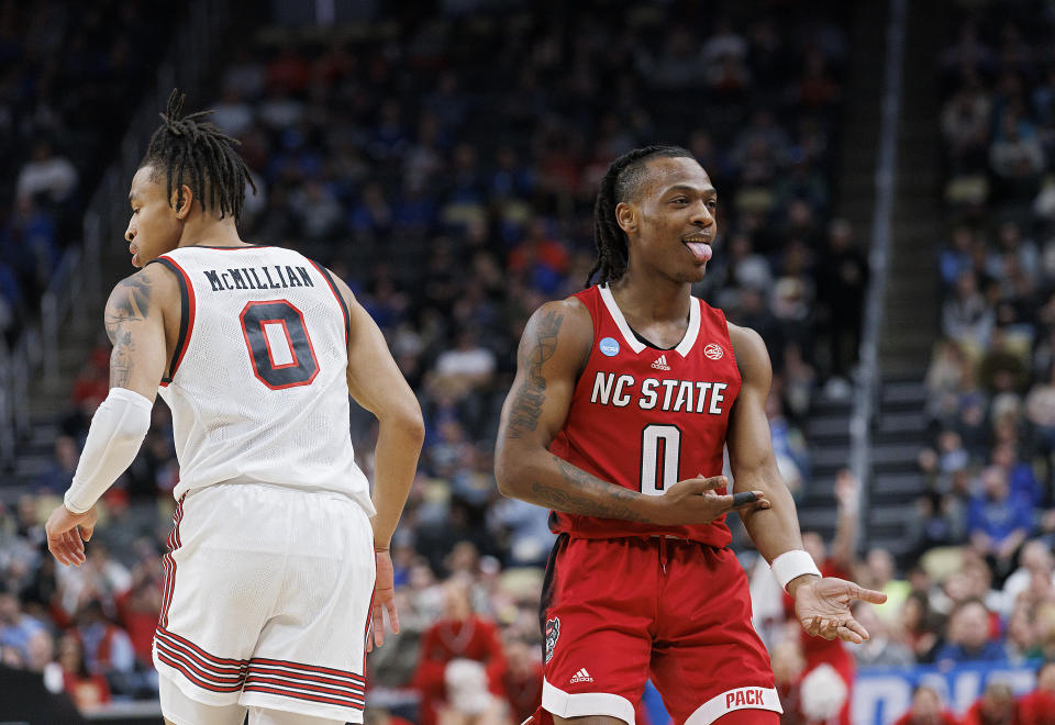 N.C. State's DJ Horne reacts after a made basket during the first half of the Wolfpack's 80-67 win in the first round of the NCAA Tournament on Thursday, March 21, 2024, at PPG Paints Arena in Pittsburgh, Pa. (Kaitlin McKeown/The News & Observer via AP)