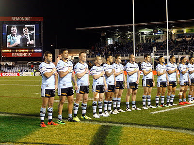 Sharks players mark 'Rise for Alex' round.