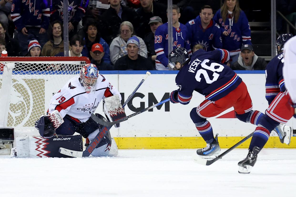 Jan 14, 2024; New York, New York, USA; Washington Capitals goaltender Charlie Lindgren (79) makes a save against New York Rangers left wing Jimmy Vesey (26) during the third period at Madison Square Garden. Mandatory Credit: Brad Penner-USA TODAY Sports