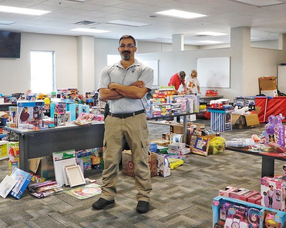 Port Orange police officer Wayne Jean lead the Cops for Christmas initiative for the second time in 2021. His nonprofit Spouses Backing the Blue is a partner in the effort.