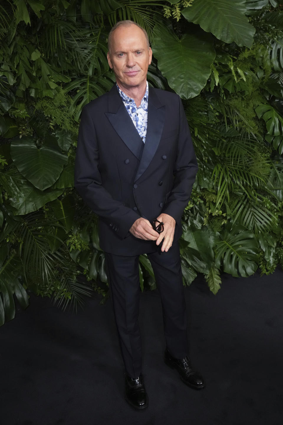 Michael Keaton arrives at Chanel's 15th Annual Pre-Oscar Awards Dinner on Saturday, March 9, 2024, at the Beverly Hills Hotel in Los Angeles. (Photo by Jordan Strauss/Invision/AP)