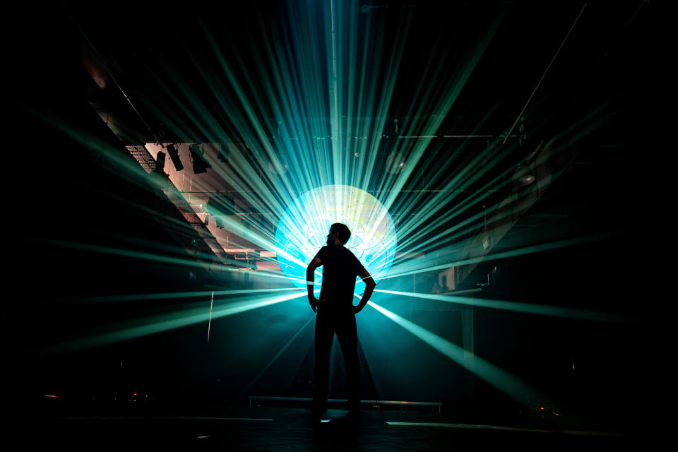 <p>Limbic Cinema artist Thom Buttery makes final checks to Spectra, an immersive multi-media piece set to music by artist K-Lone, which has been installed at The Station, Bristol, as part of the Simple Things Festival. Picture date: Wednesday September 22, 2021.</p>
