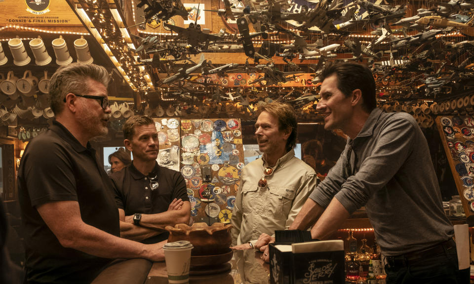 From left: Christopher McQuarrie, Tommy Harper, Jerry Bruckheimer and Joseph Kosinski on the set of Top Gun: Maverick. - Credit: Paramount Pictures