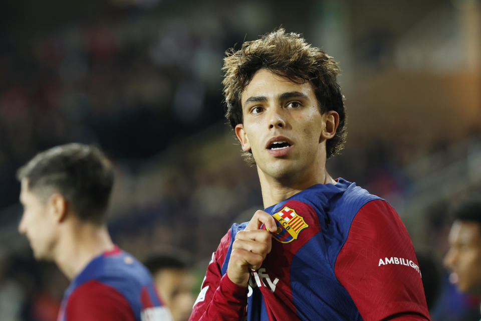 Joao Felix celebra tras anotar el segundo gol del Barcelona ante el Porto en el partido de la Liga de Campeones, el martes 28 de noviembre de 2023, en Barcelona. (AP Foto/Joan Monfort)