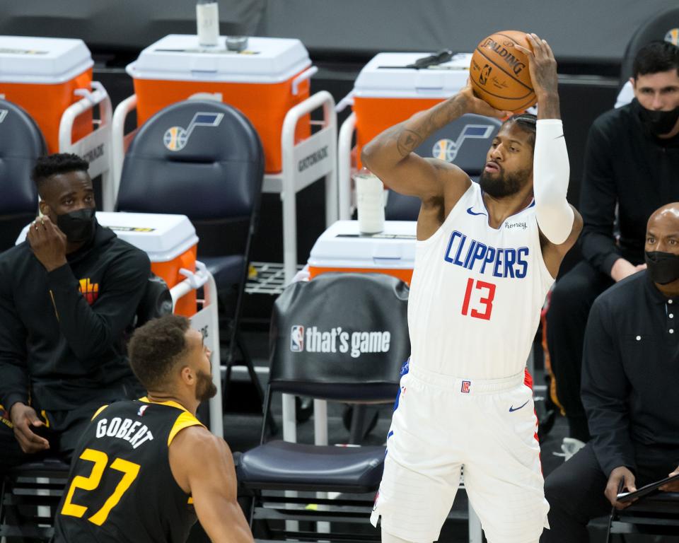 LA Clippers guard Paul George shoots the ball during the first quarter of Game 5 against the Utah Jazz.