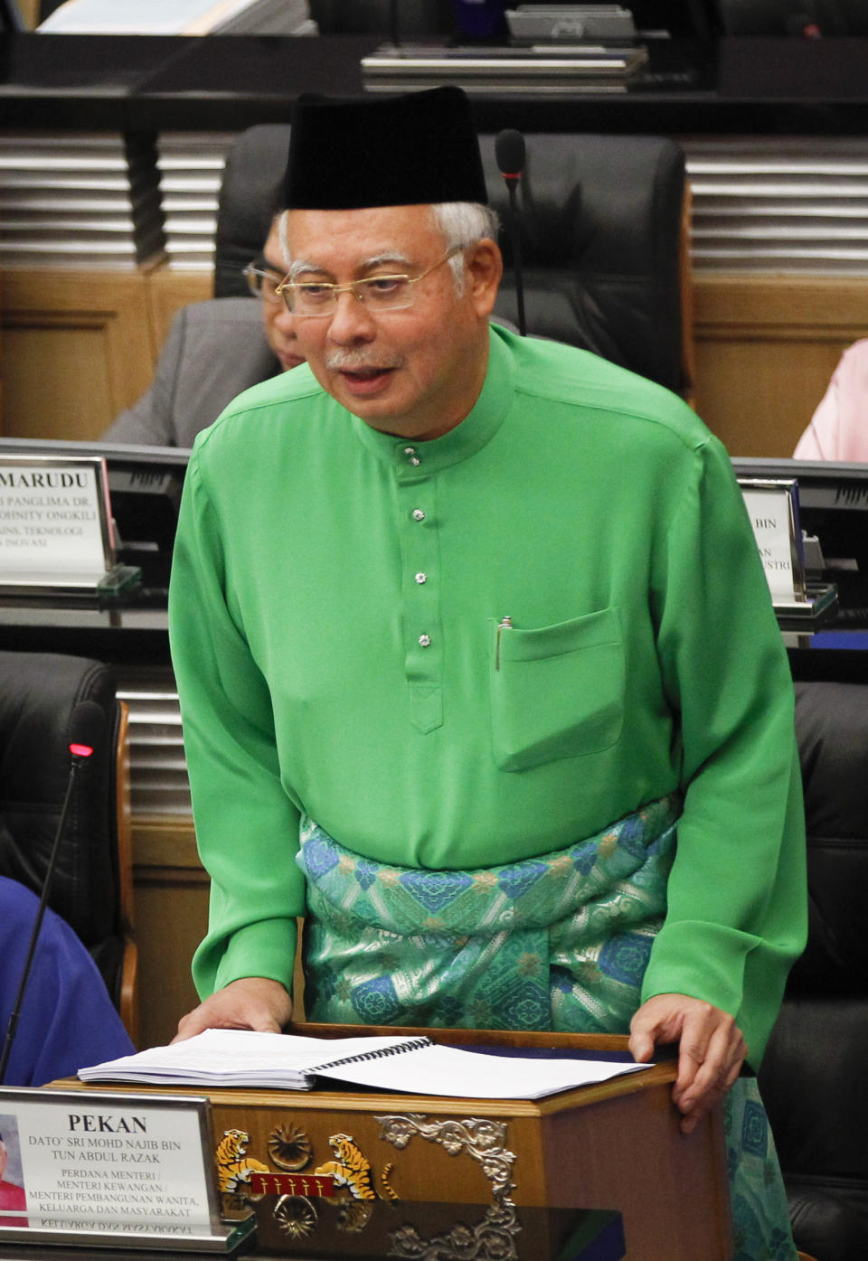 Malaysian Prime Minister and Finance Minister Najib Razak speaks as he unveils the Malaysia's 2013 budget at Parliament in Kuala Lumpur, Malaysia, Friday, Sept. 28, 2012. Malaysia plans to splash $251.6 billion ringgit ($82.1 billion) next year with cash handouts, affordable housing and income tax cuts to shore up support for the ruling coalition ahead of looming general elections. (AP Photo/Vincent Thian)