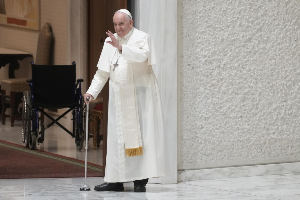 Pope Francis arrives in the Paul VI hall on the occasion of the weekly general audience at the Vatican, Wednesday, Aug. 3, 2022. (AP Photo/Gregorio Borgia)