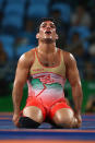 <p>Habibollah Jomeh Akhlaghi of the Islamic Republic of Iran looks dejected following defeat in his bout against Denis Kudla of Germany in the Men’s Greco-Roman 85 kg Repechage on Day 10 of the Rio 2016 Olympic Games at Carioca Arena 2 on August 15, 2016 in Rio de Janeiro, Brazil. (Photo by Ryan Pierse/Getty Images) </p>