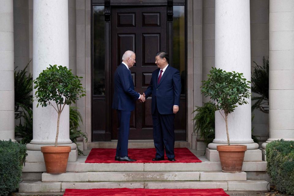 US President Joe Biden greets Chinese President Xi Jinping on Wednesday before a meeting during the Asia-Pacific Economic Cooperation (APEC) Leaders' week.
