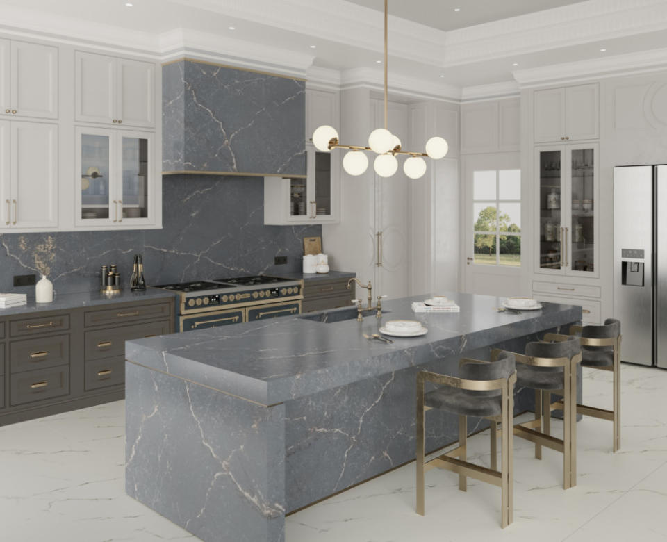 <p>Metallic veining in a gray kitchen countertop coordinate with other gold accents.</p><p>Cosentino</p>