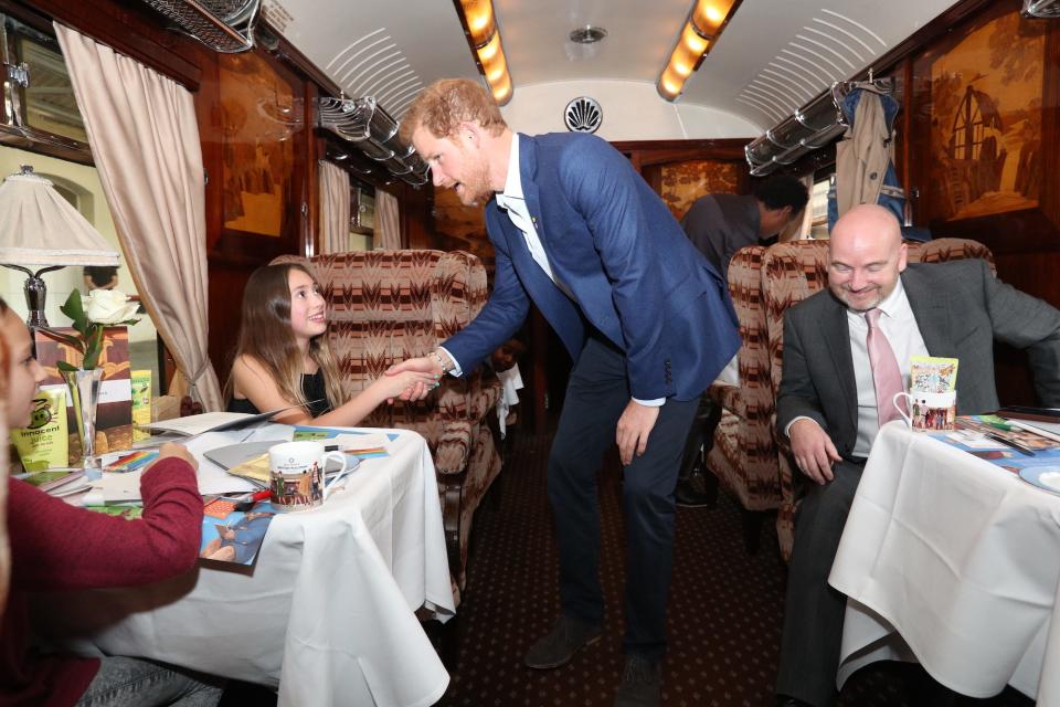 Prince Harry is pictured on Belmond's British Pullman train