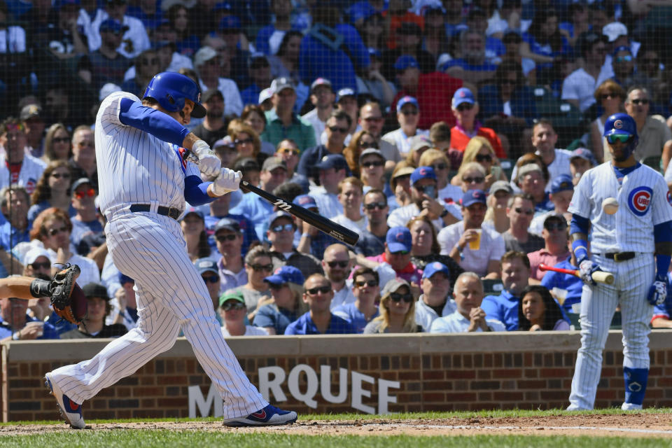 Chicago Cubs' Anthony Rizzo hits an RBI single during the fourth inning of a baseball game against the San Francisco Giants Thursday, Aug. 22, 2019, in Chicago. (AP Photo/Matt Marton)