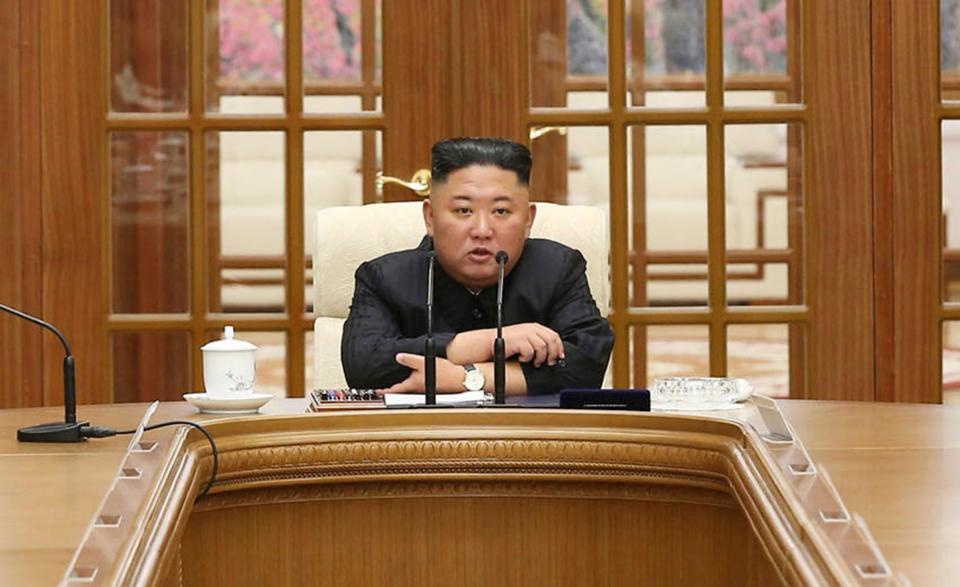 North Korean leader Kim Jong-un has warned his people of food shortages and longer Covid-19 restrictions (AP)