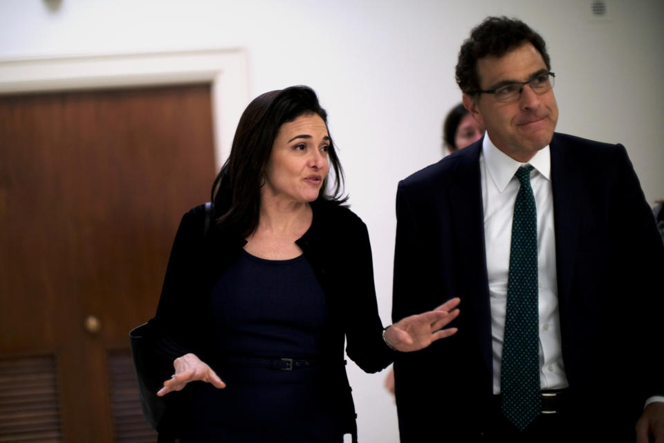 Sheryl Sandberg, Facebook's chief operating officer,&nbsp;and Elliot Schrage, its vice president of global communications and public policy, meet with lawmakers on Capitol Hill on Oct. 12. (Photo: JAMES LAWLER DUGGAN/Reuters)