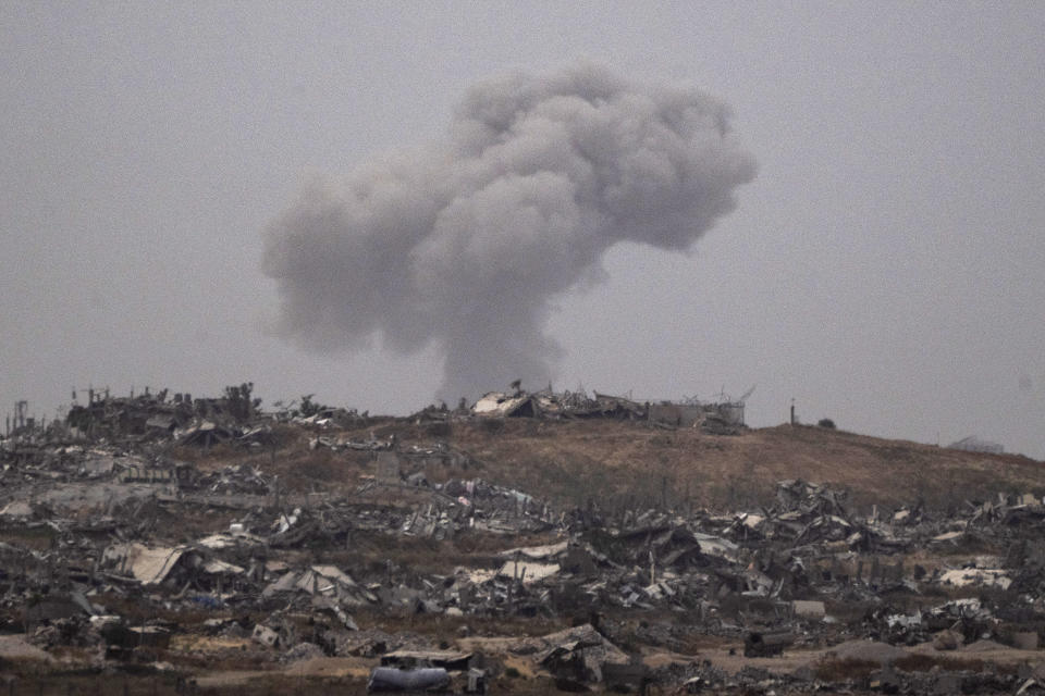 Smoke rises to the sky after an explosion in the Gaza Strip as seen from southern Israel, Thursday, April 25, 2024. (AP Photo/Leo Correa)