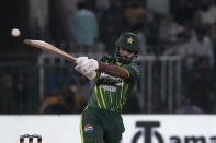 Pakistan's Fakhar Zaman plays a shot during the fifth T20 international cricket match between Pakistan and New Zealand, in Lahore, Pakistan, Saturday, April 27, 2024. (AP Photo/K.M. Chaudary)